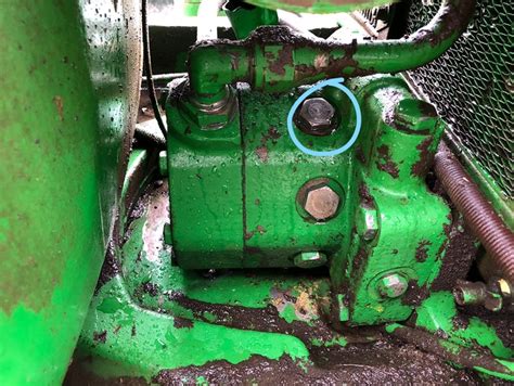 If pump has serial tag, the second number will be RP1050G. . John deere 4440 hydraulic pump removal